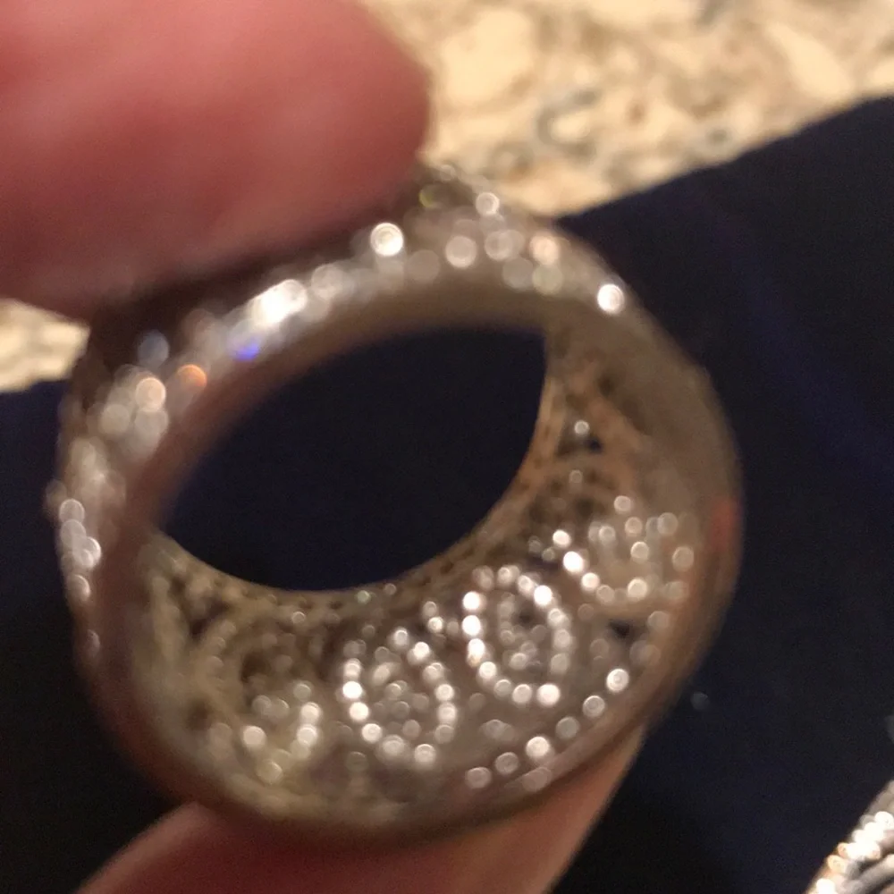 Ring with stone pattern all around